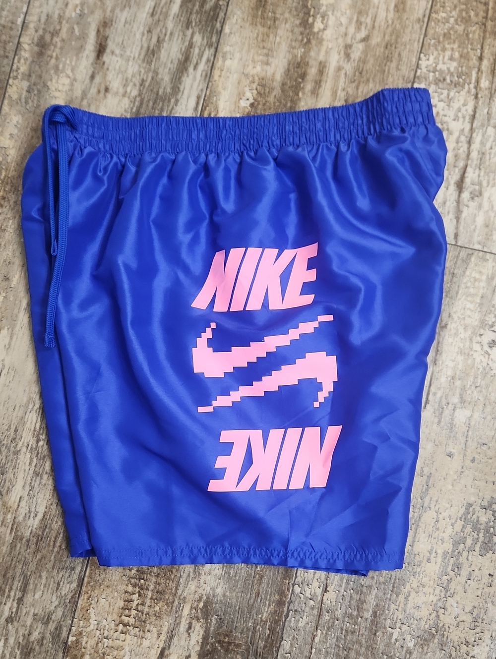 Nike Royal Blue Shorts with Pink Logo